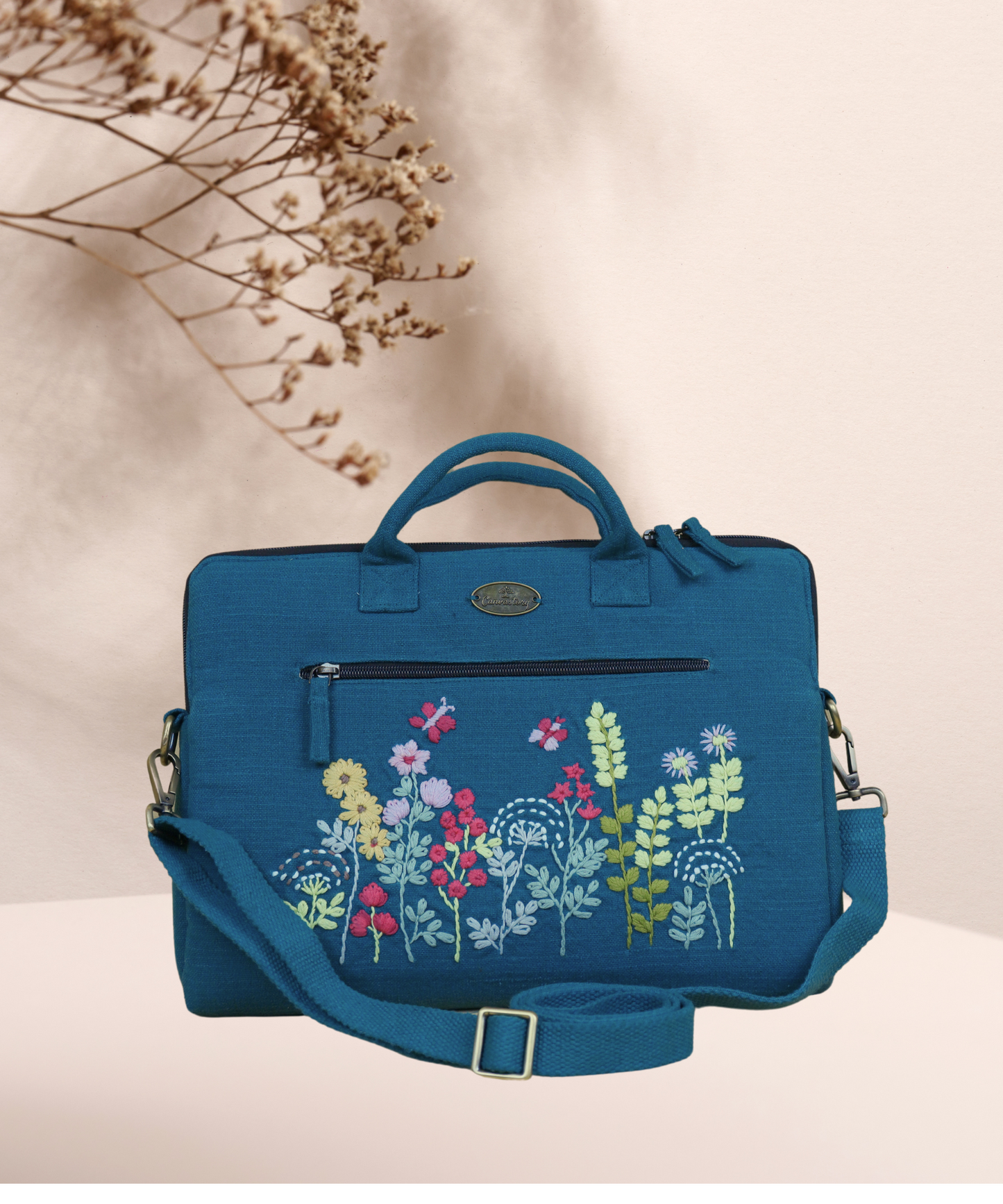 Hand-embroidered laptop bags, Handcrafted laptop bags, Embroidered canvas laptop bags, Handmade laptop bags, embroidery-design laptop bags, Laptop bags with embroidery, Laptop bags with hand stitching, Stylish embroidered laptop bags, embroidery-design laptop bags, Luxury embroidered laptop bags, Custom embroidered laptop bags.