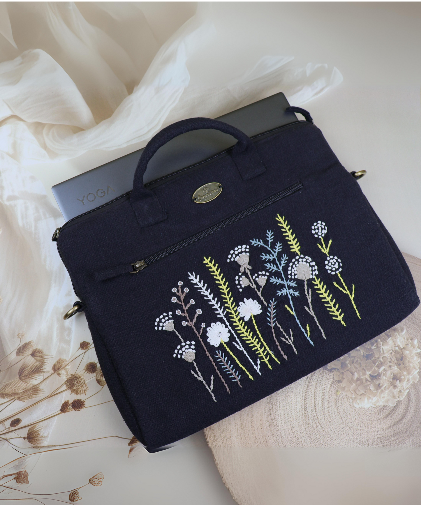 Hand-embroidered laptop bags, Handcrafted laptop bags, Embroidered canvas laptop bags, Handmade laptop bags, embroidery-design laptop bags, Laptop bags with embroidery, Laptop bags with hand stitching, Stylish embroidered laptop bags, embroidery-design laptop bags, Luxury embroidered laptop bags, Custom embroidered laptop bags.