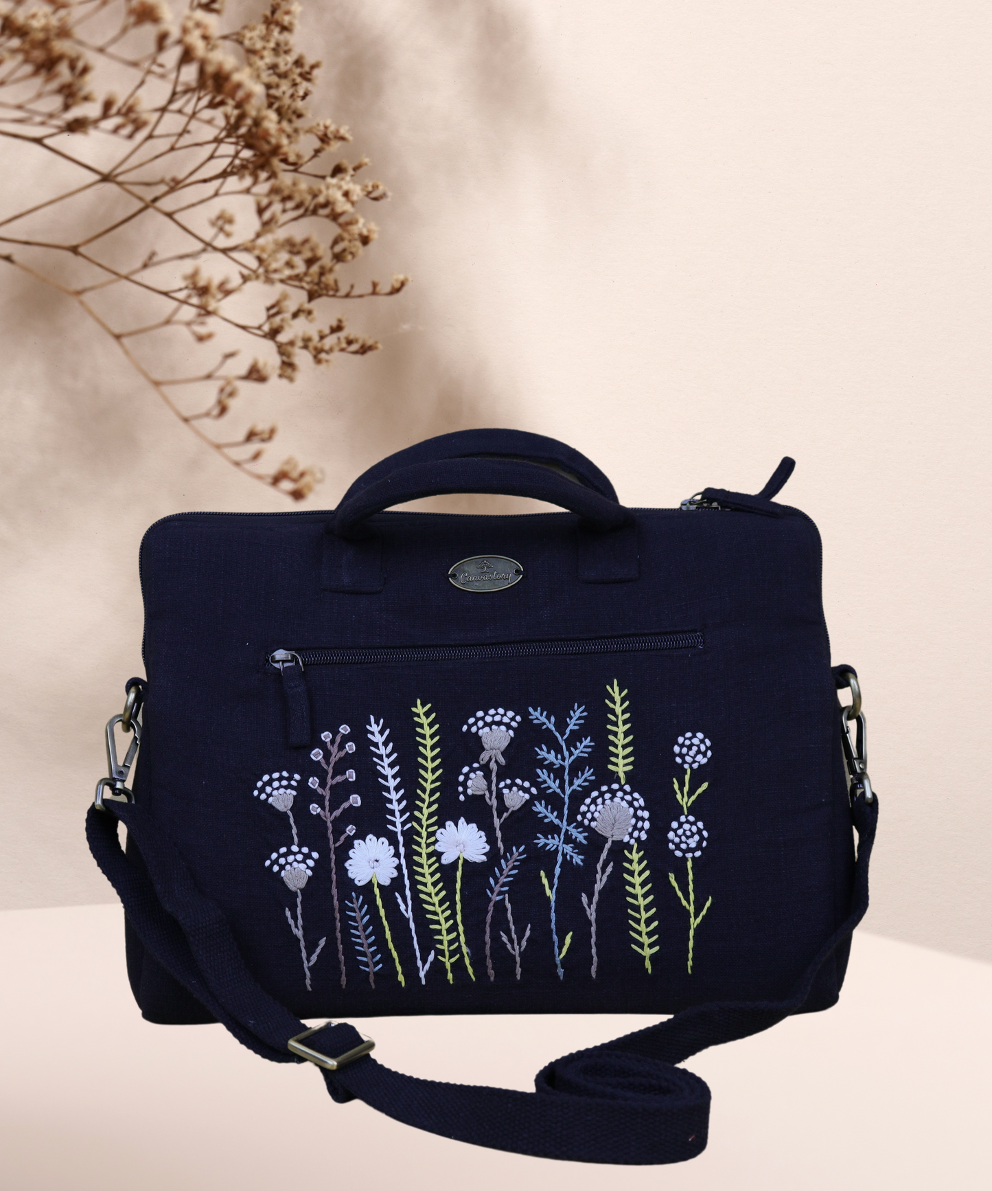 Hand-embroidered laptop bags, Handcrafted laptop bags, Embroidered canvas laptop bags, Handmade laptop bags, embroidery-design laptop bags, Laptop bags with embroidery, Laptop bags with hand stitching, Stylish embroidered laptop bags, embroidery-design laptop bags, Luxury embroidered laptop bags, Custom embroidered laptop bags.